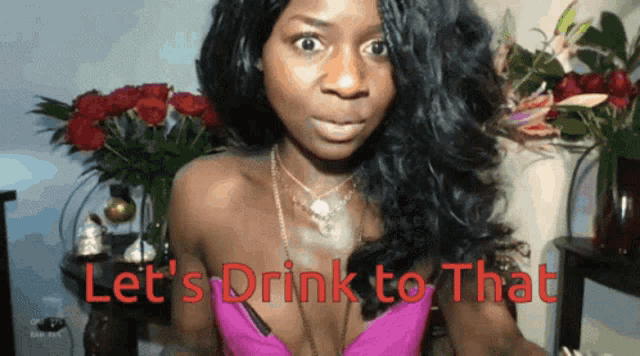 a woman in a pink top with the words let 's drink to that