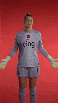 a female soccer player wears a ring jersey and shorts