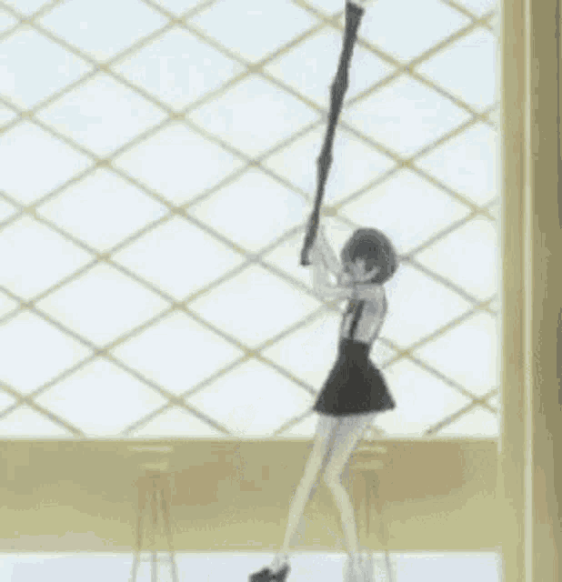 a woman in a black dress is holding a large sword in front of a window .