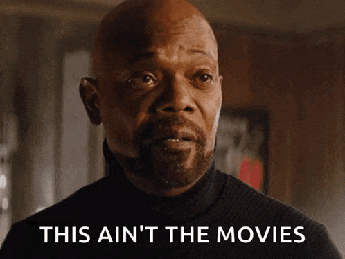 a bald man with a beard says this ain t the movies