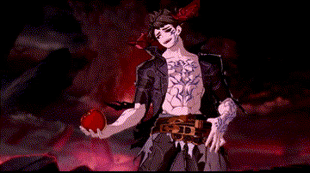 a man with tattoos on his chest is holding an apple in his hand .