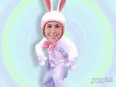 a woman is wearing a bunny costume with jibjab written on the bottom