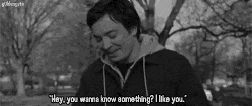 a black and white photo of a man talking on a cell phone with the caption " hey you wanna know something ? i like you "
