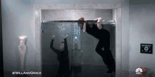 a woman is hanging upside down in a shower with the hashtag #willandgrace on the bottom