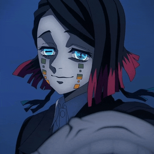 a close up of a person 's face with blue eyes