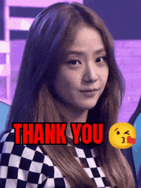 a woman in a checkered shirt is giving a thank you