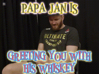 papa janis greeting you with his whiskey with a man in the background