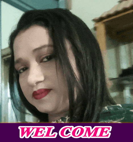 a woman 's face is on a welcome poster