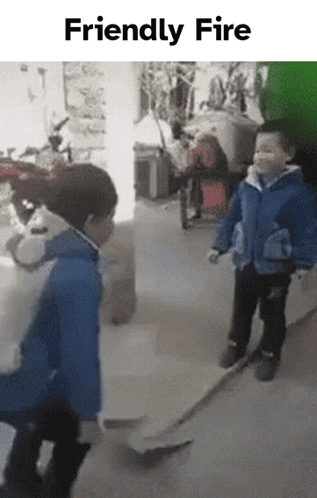 a couple of kids standing next to each other with the words friendly fire above them