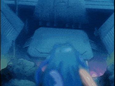 a person is swimming in the ocean near a pillar .