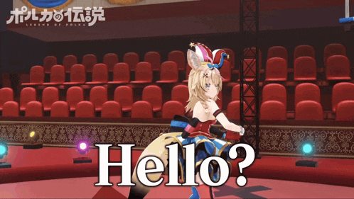a girl in a jester hat says hello in front of an empty auditorium
