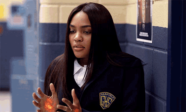 a girl with a ghs badge on her uniform
