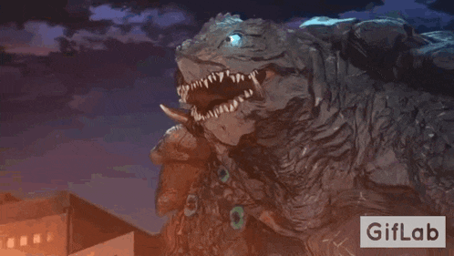 a monster with a blue eye is standing in front of a building .