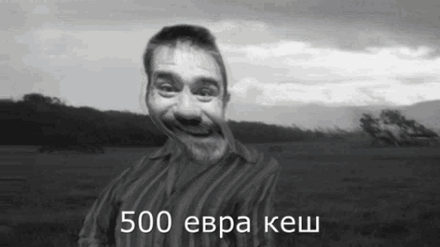 a black and white photo of a man with the words 500 evra kesh written below him