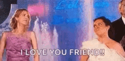 two women in purple dresses are standing next to each other with the words `` i love you friend '' .