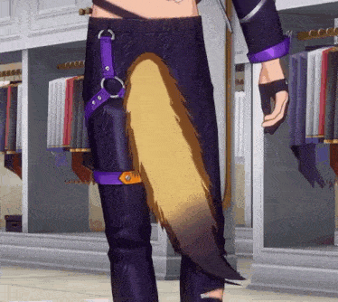 a close up of a person 's pants with a furry tail