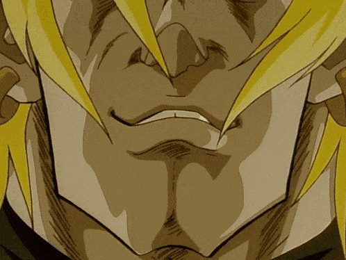 a close up of a man 's face with a smile on it