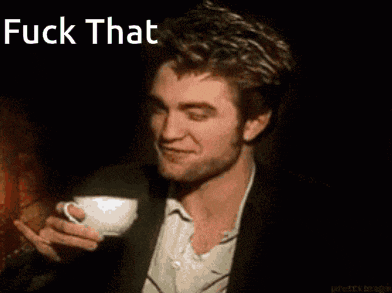 a man in a suit is holding a cup of coffee and making a face that says fuck that