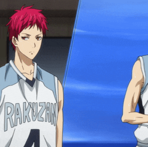 a man with red hair and a rakuzan jersey