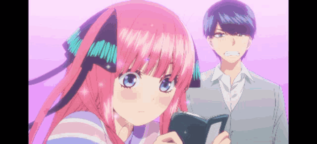 a girl with pink hair is reading a book next to a man with blue hair