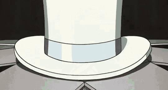 a white top hat is sitting on a gray table