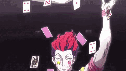 a man with red hair and a star on his face is juggling playing cards in the air .