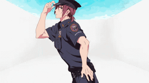 a man in a police uniform is standing in a room with his hand on his forehead .