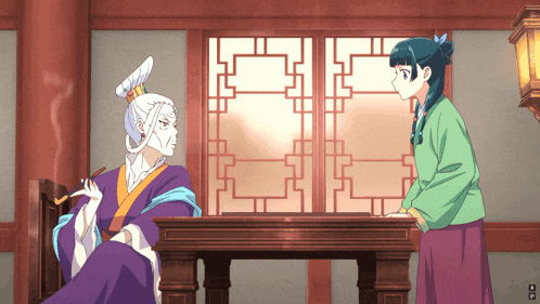 a girl in a green shirt is standing next to an older woman in a purple robe
