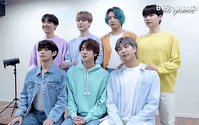 a group of young men are posing for a picture and the word episode is on the bottom