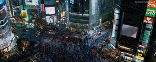 an aerial view of a busy city intersection with a sign that says ' danceghosthere ' on it