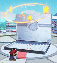 a paper mario standing next to a laptop computer