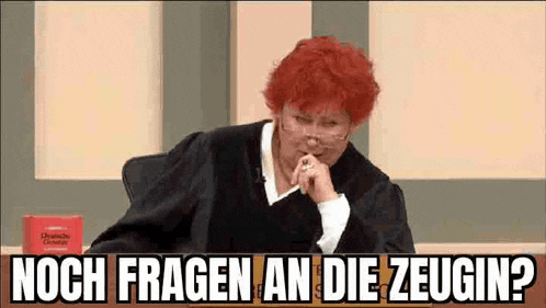 a woman with red hair is sitting in a courtroom with the words noch fragen an die zeugen
