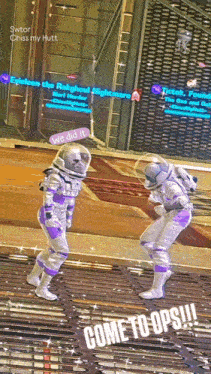 two astronauts are standing next to each other with the words come to ops written on the bottom
