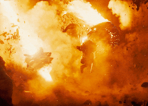 a large explosion with a dragon in the middle