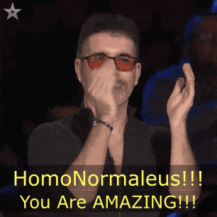 a man wearing red glasses applauds with the words homonormaleus !!! you are amazing !!! below him
