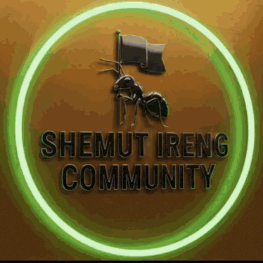 a logo for the shemut ireng community with an ant holding a black flag