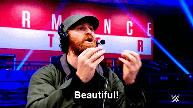 a man wearing headphones is saying beautiful