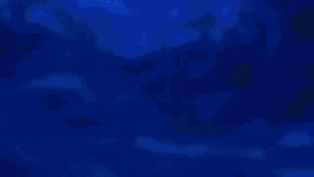 a girl and a monster are looking at each other