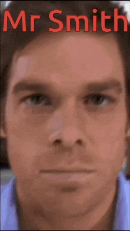 a close up of a man 's face with the name mr smith written above it