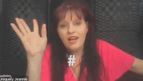 a woman in a pink shirt with the words #ithappens in a small town