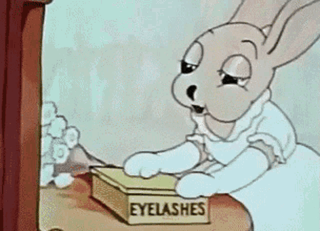 a cartoon rabbit is looking at herself in the mirror while holding a box of eyelashes