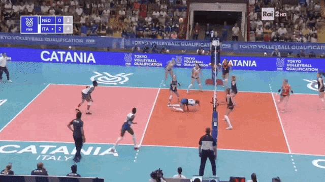 a volleyball game is being played on a court that says catania