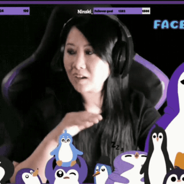 a woman wearing headphones is surrounded by penguins including one that says zzz on it