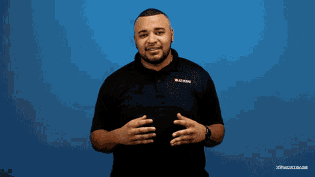 a man wearing a black shirt with miami on it