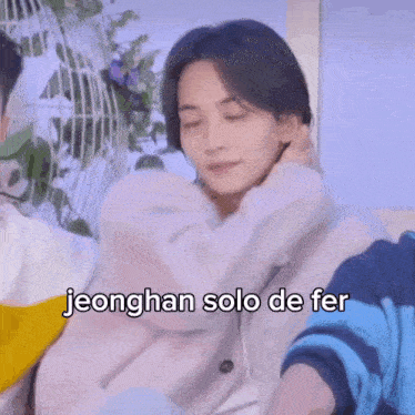 a close up of a person 's face with a caption that says jeonghan solo de fer