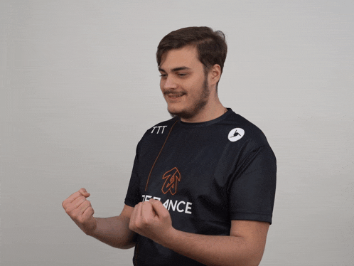 a man wearing a shirt that says " zerance " on it