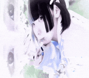 a drawing of a girl 's eyes with chinese writing on the bottom