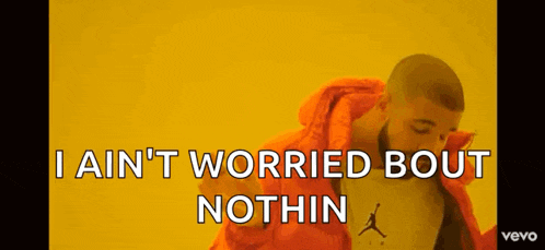 a man in an orange jacket says i ain t worried bout nothin .