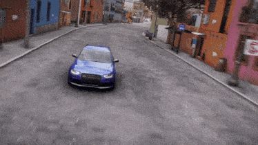 a blue audi is driving down a street in front of a no parking sign