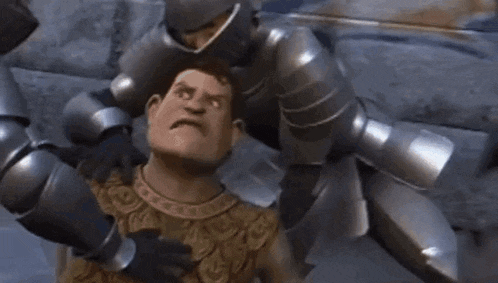 a man in armor is being attacked by a group of robots .